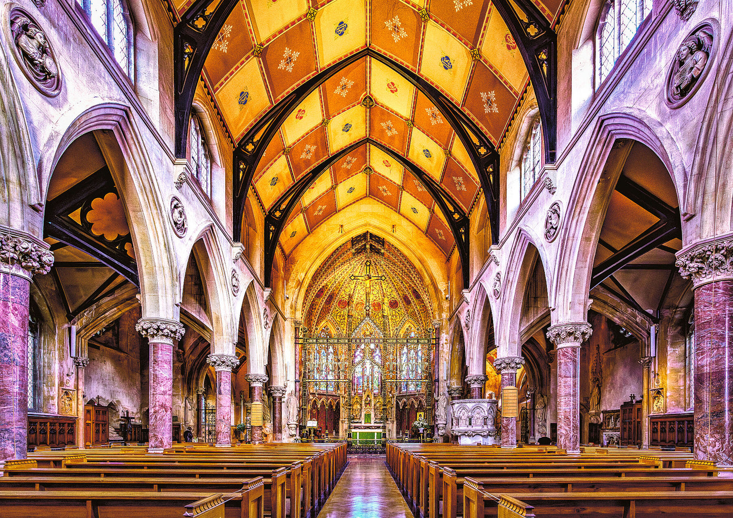 Nave Saint John's Church Bath, in Bath, England, with warm light on wood