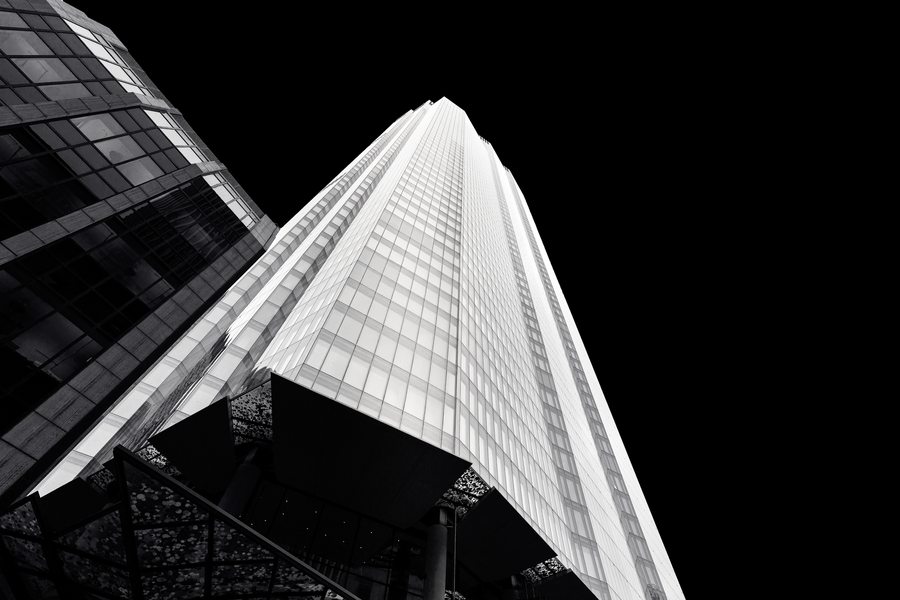 Black and white photograph of 22 Bishopsgate London viewed from below emphasising height modern architecture and geometric lines.