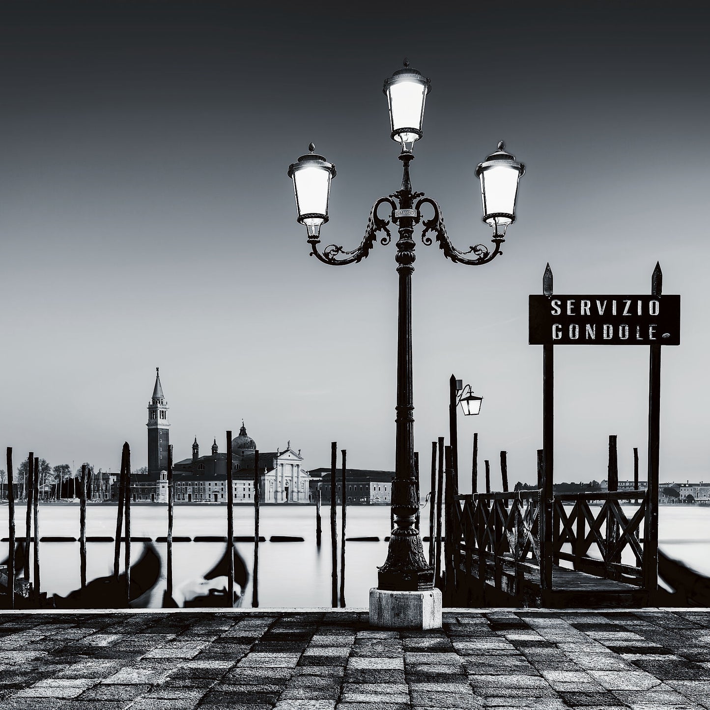 Black and white fine art of the Gondola Serive in Venice.