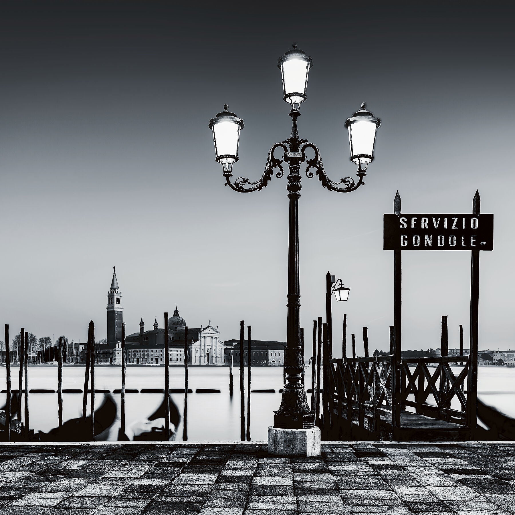 Black and white fine art of the Gondola Serive in Venice.