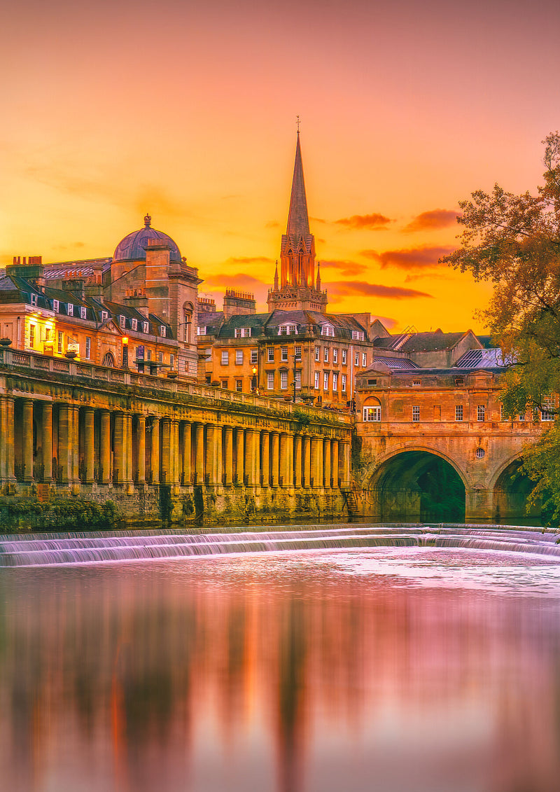 Reflections of Bath in the Golden Hour, at sunset, in Bath, United Kingdom, with warm light