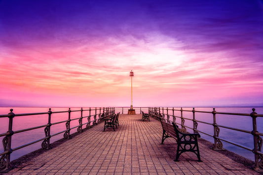 Banjo Pier, at sunset, in Swanage, United Kingdom, with cool light