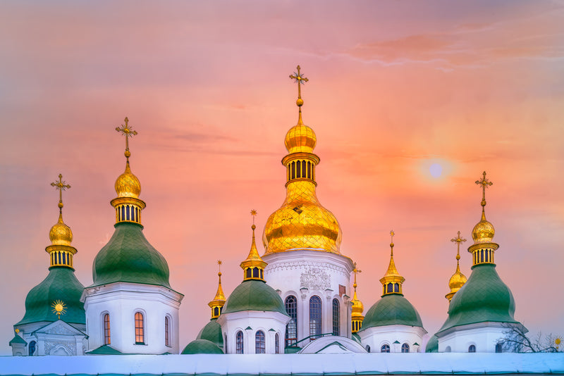 Domes of Saint Sophia, at sunset, in Kyiv, with gold light