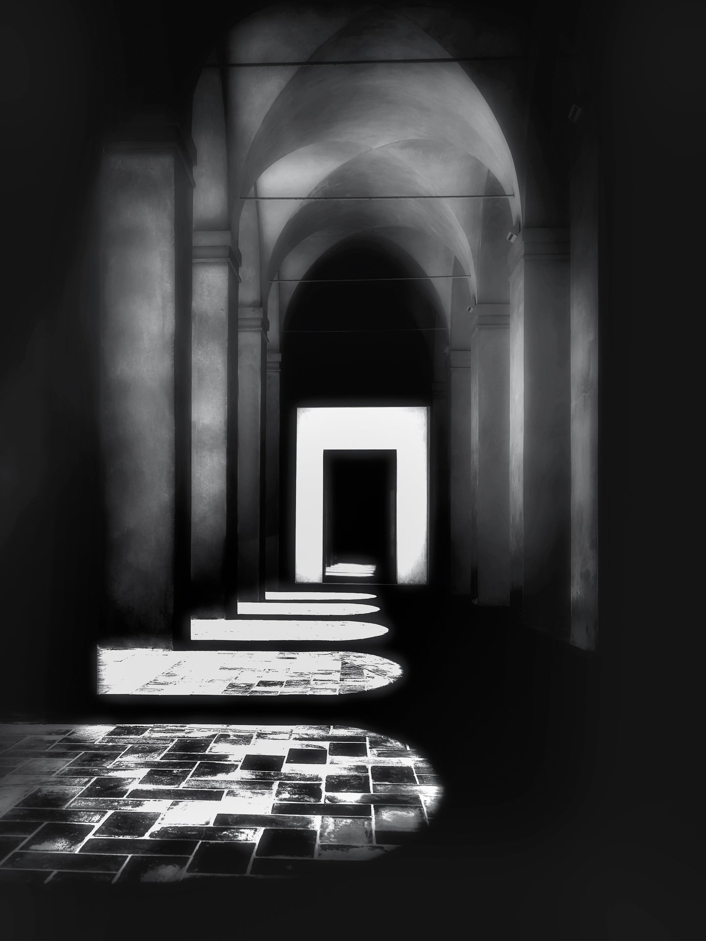 A fine art black and white photograph taken in the Real Alcázar of Seville, showing a sunlit colonnade with strong geometric shadows and historic stone arches.